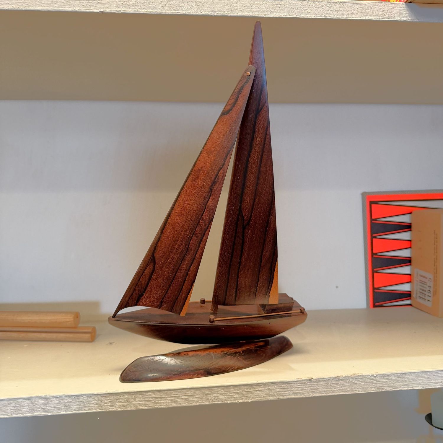 Hand-carved teak or rosewood sailboat sculpture, 16"