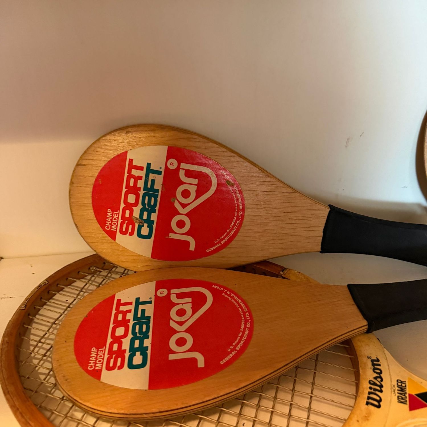 Group of vintage wood racquets and paddles Group of vintage wood racquets and paddles