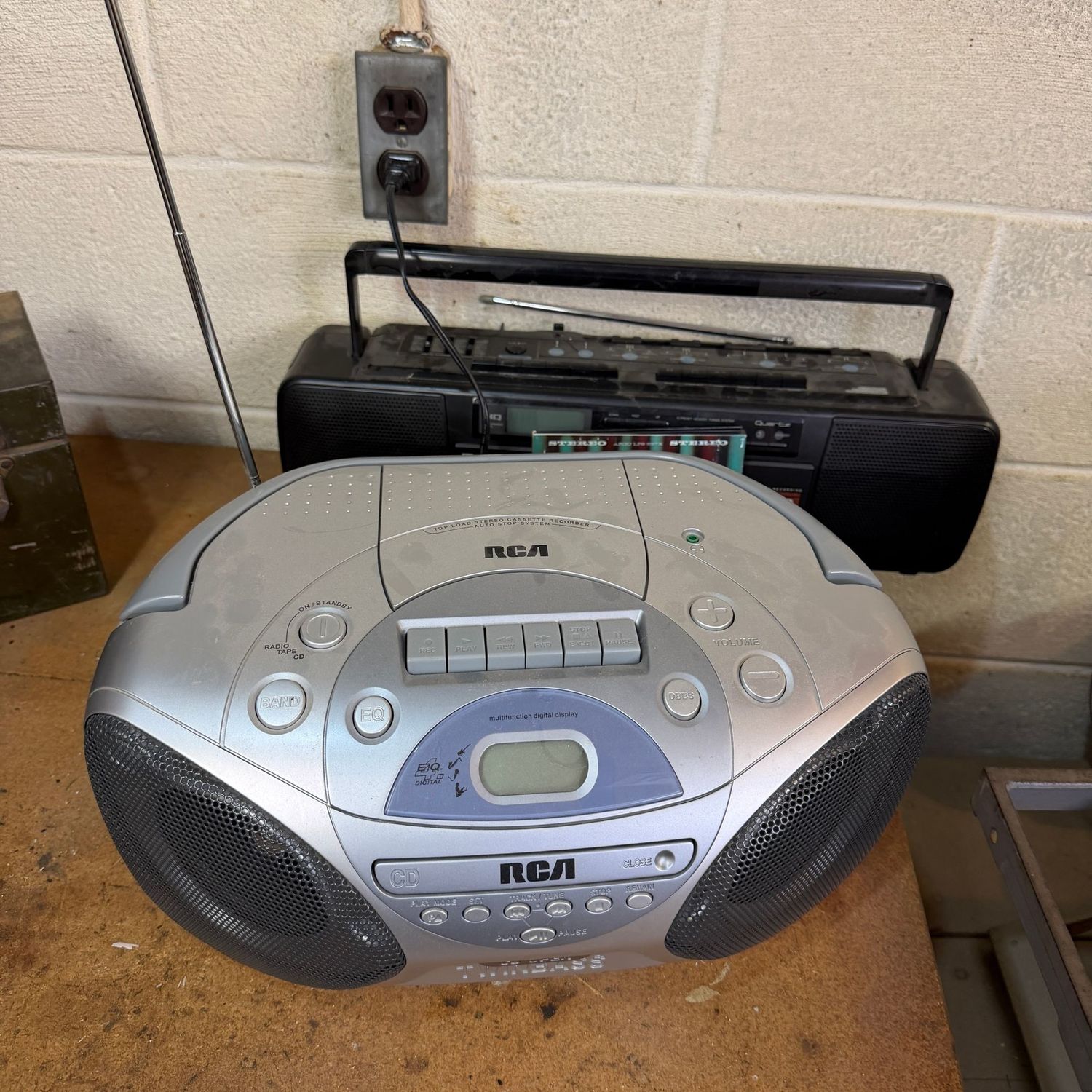 Two great radios, one plays cds well, the other plays tapes well, both play radios - but only 1 cord that fits both of them