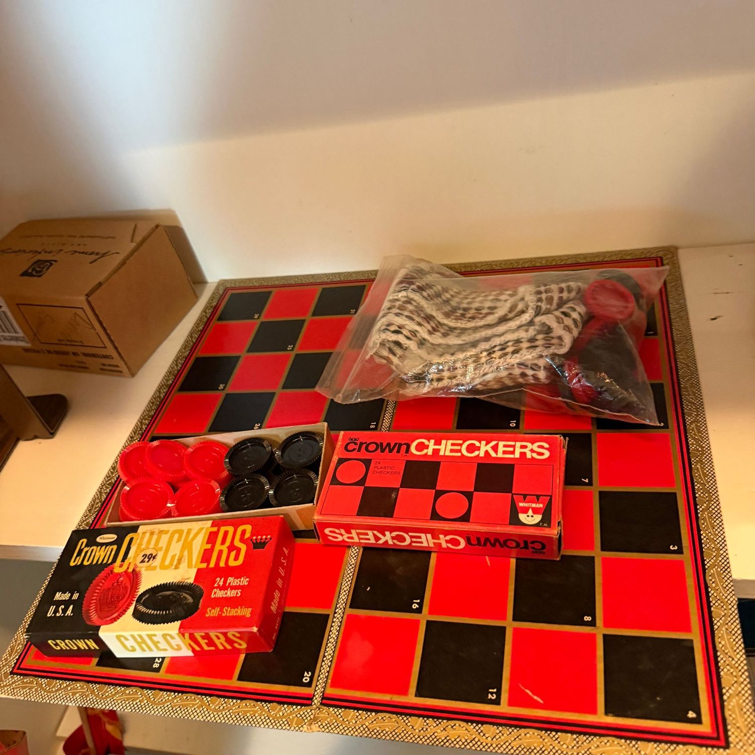 Checkers board, vintage checkers in boxes, cloth checkers board