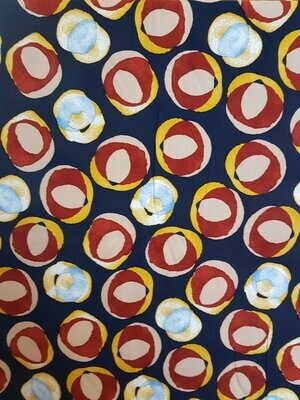 Viscose Twill Print dress fabric. Circles design in Blue/Rust/Gold