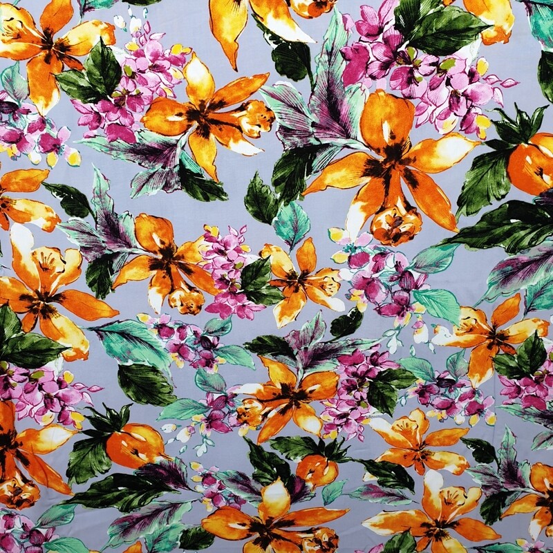 Rayon Viscose Dress fabric Large orange and pink flowers with leaves on lilac background