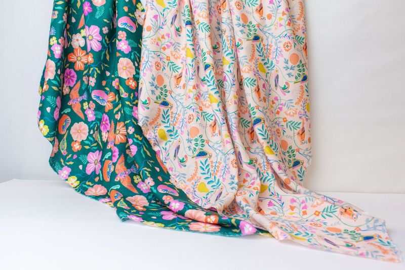 Songbird 100% Rayon Dressmaking Fabric  in Pale pink and Dark Green