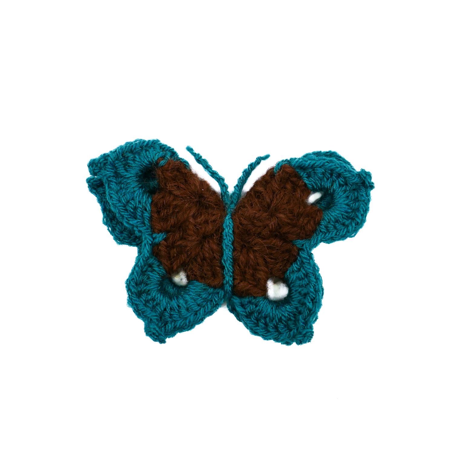 Papillon vert avec le coeur en laine d'Ally