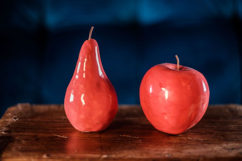 Ceramic pink pear with copper stalk