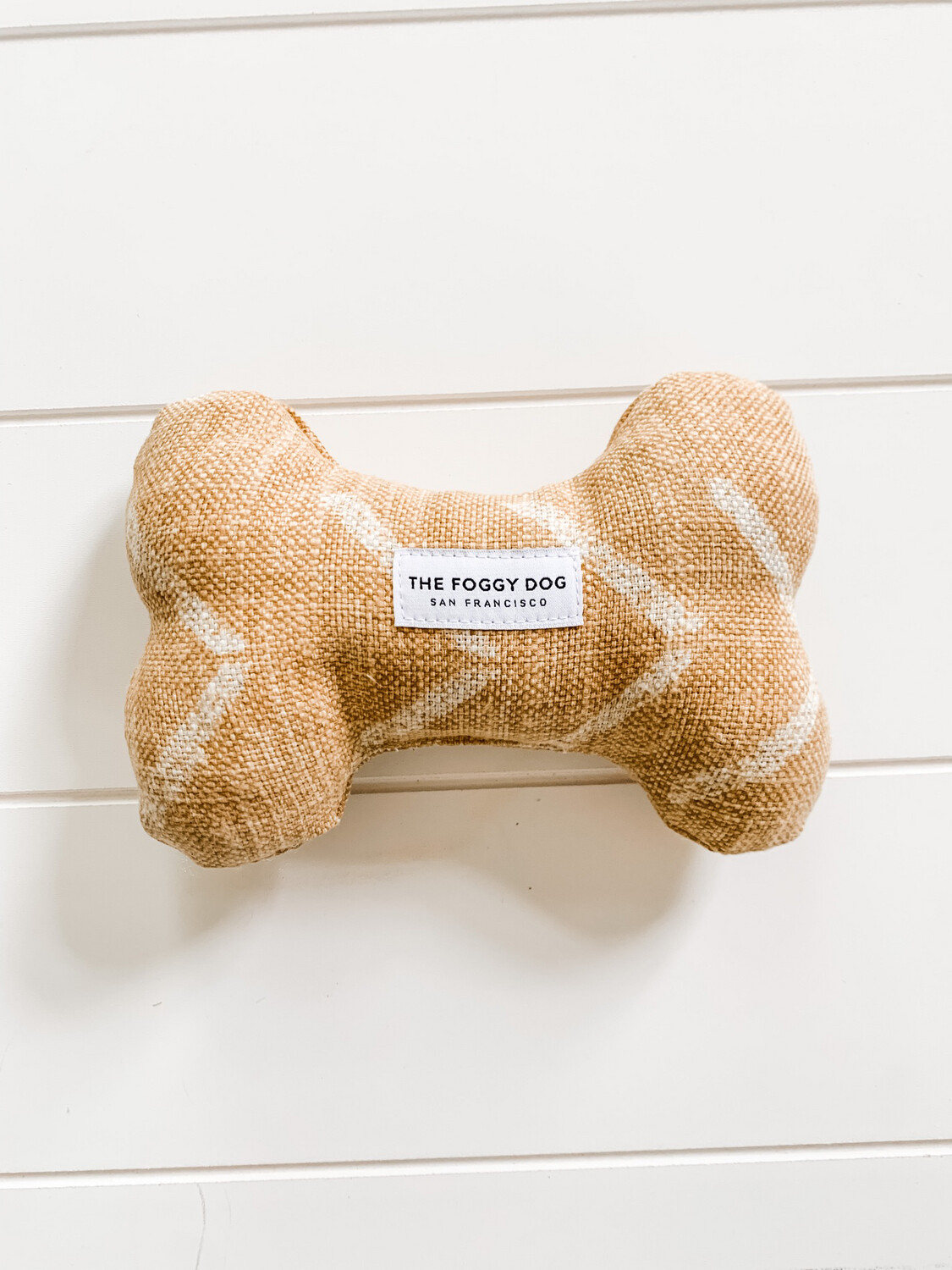 Ochre bone stuffed toy