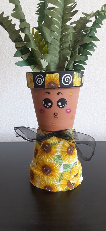 Sunflower terracotta pot person