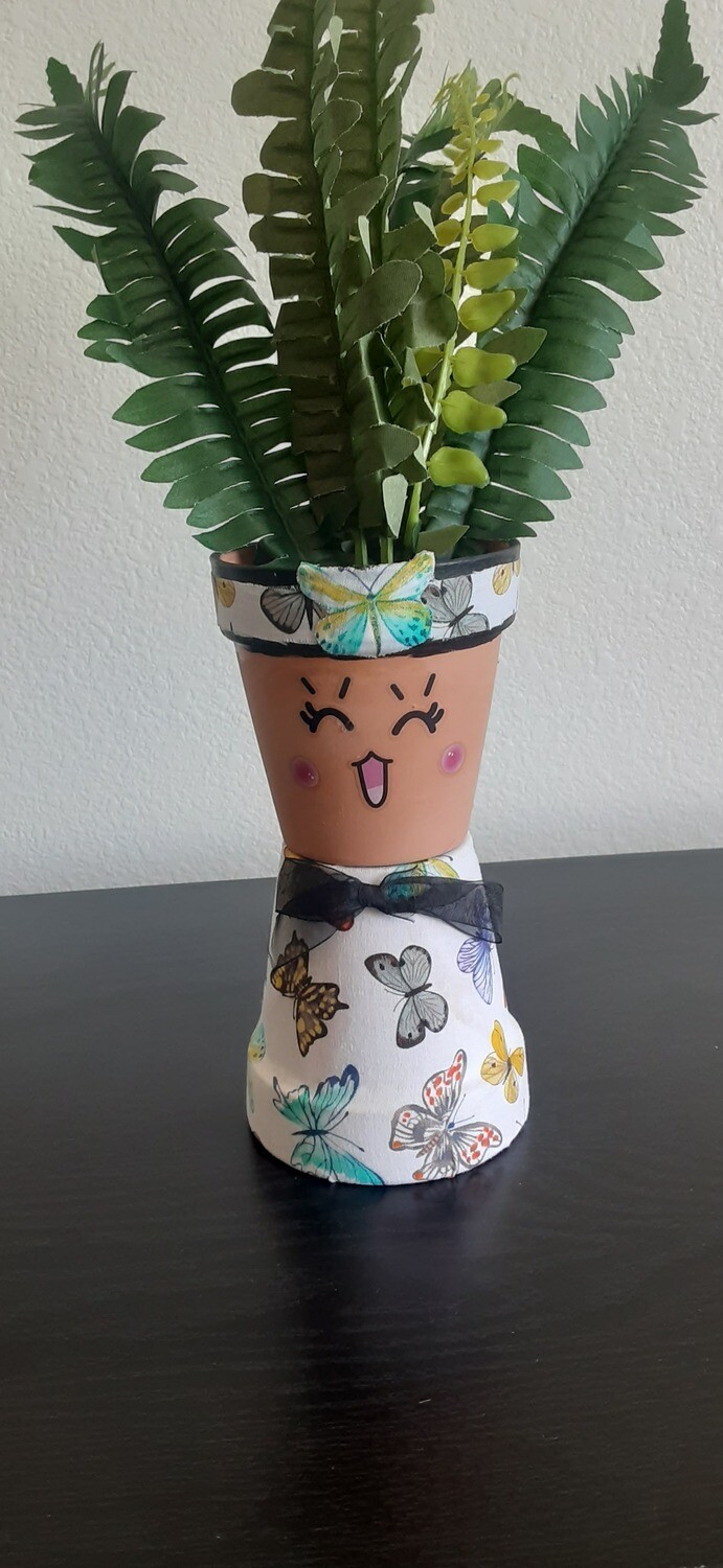 Butterfly terracotta pot person