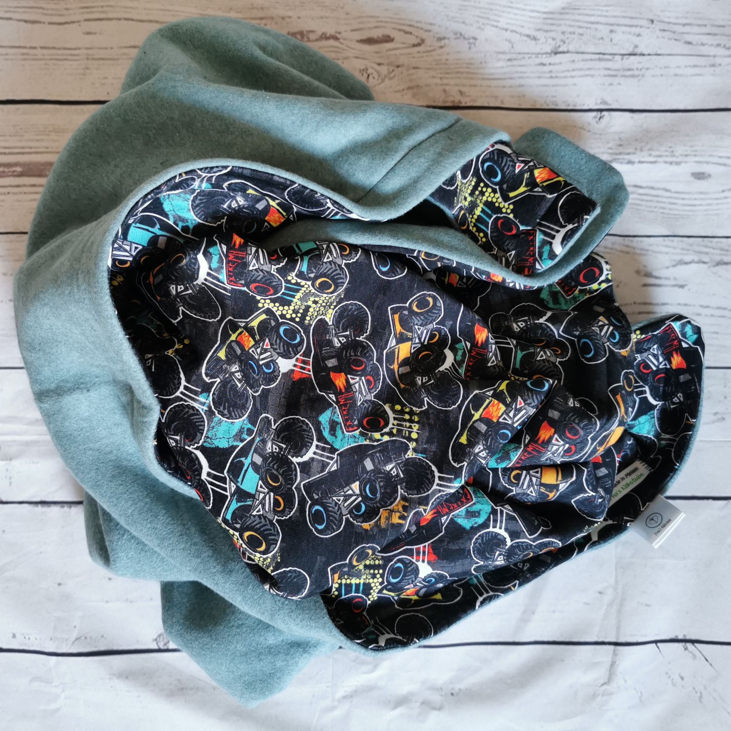 Kuscheldecke XL 1,50m "Monstertrucks-blau" Autos VS aus Sweat und RS aus Fleece