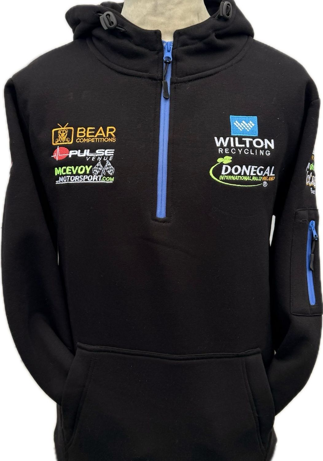 NEW WILTON DONEGAL HOODED QUARTER ZIP BLACK WITRH ROYAL ZIPS 2026/7