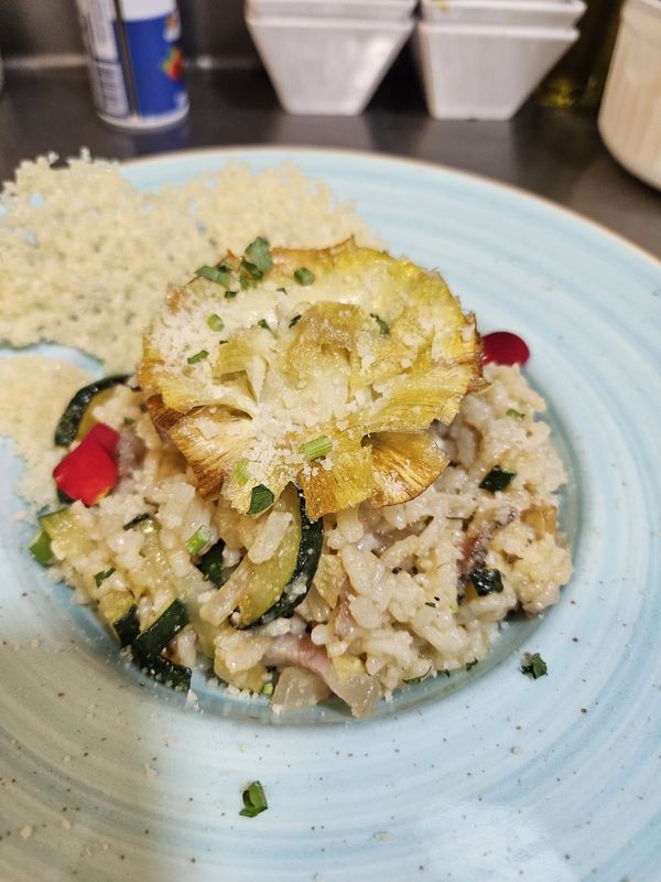 Risotto de zucchine, carciofi e guanciale