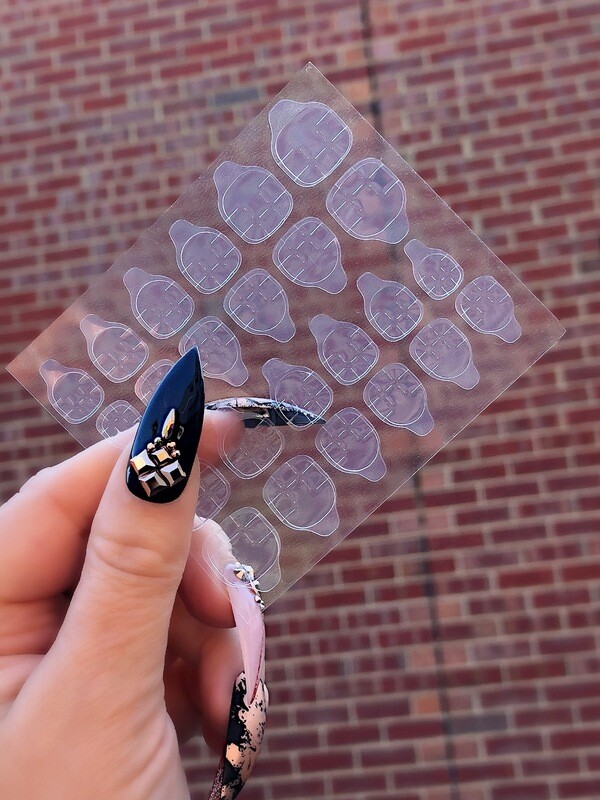 Adhesive tabs for press on nails