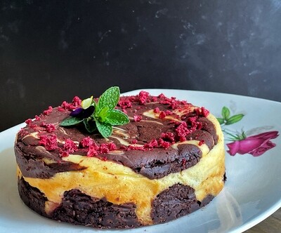 Chocolate swirl cheesecake with raspberries (small, serves 4-6)