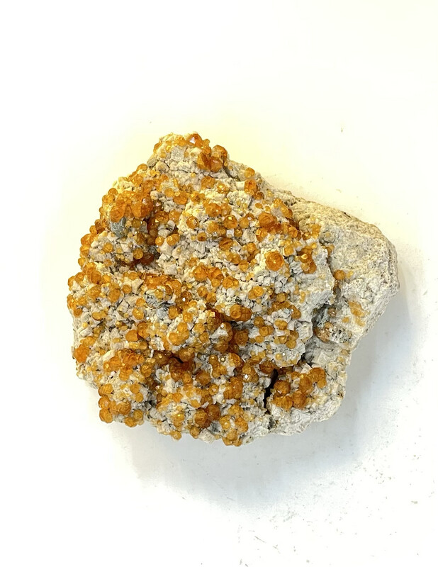 Spessartine Garnet in Feldspar