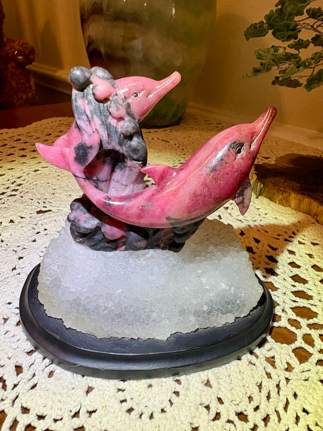 Carved Dolphins above white waves in Rhodonite For Sale