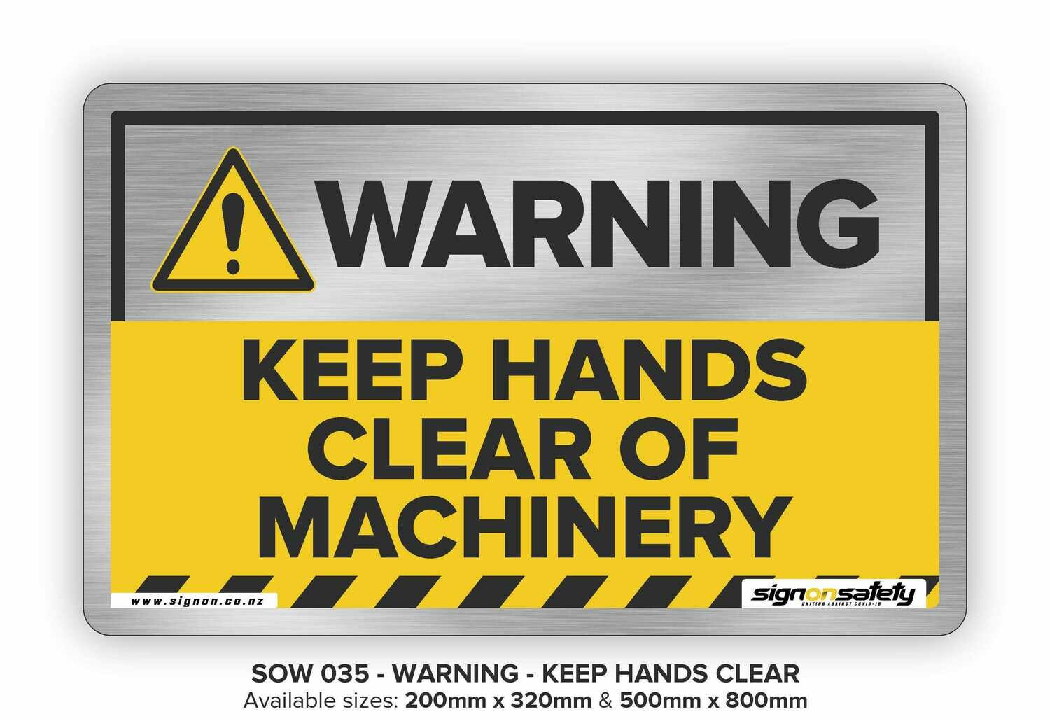 Warning - Keep Hands Clear Of Machinery