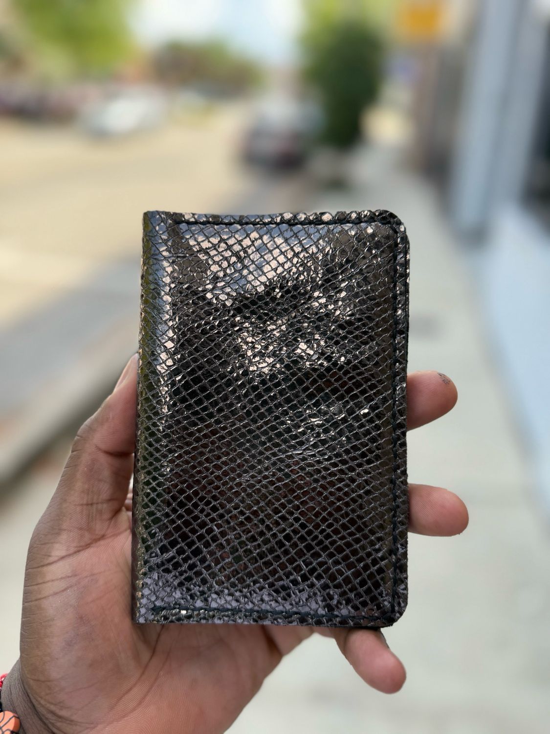Snake embossed passport wallet