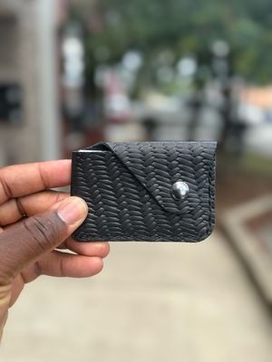 “The Snap” black woven leather