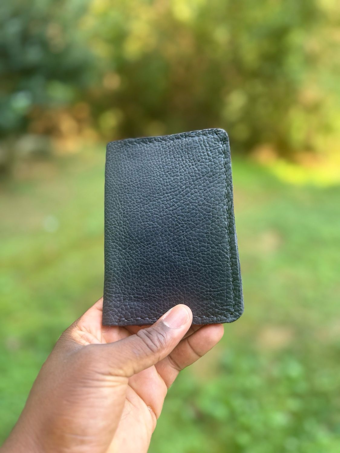 The “Explorer” Pebbled Black Bison Passport Wallet