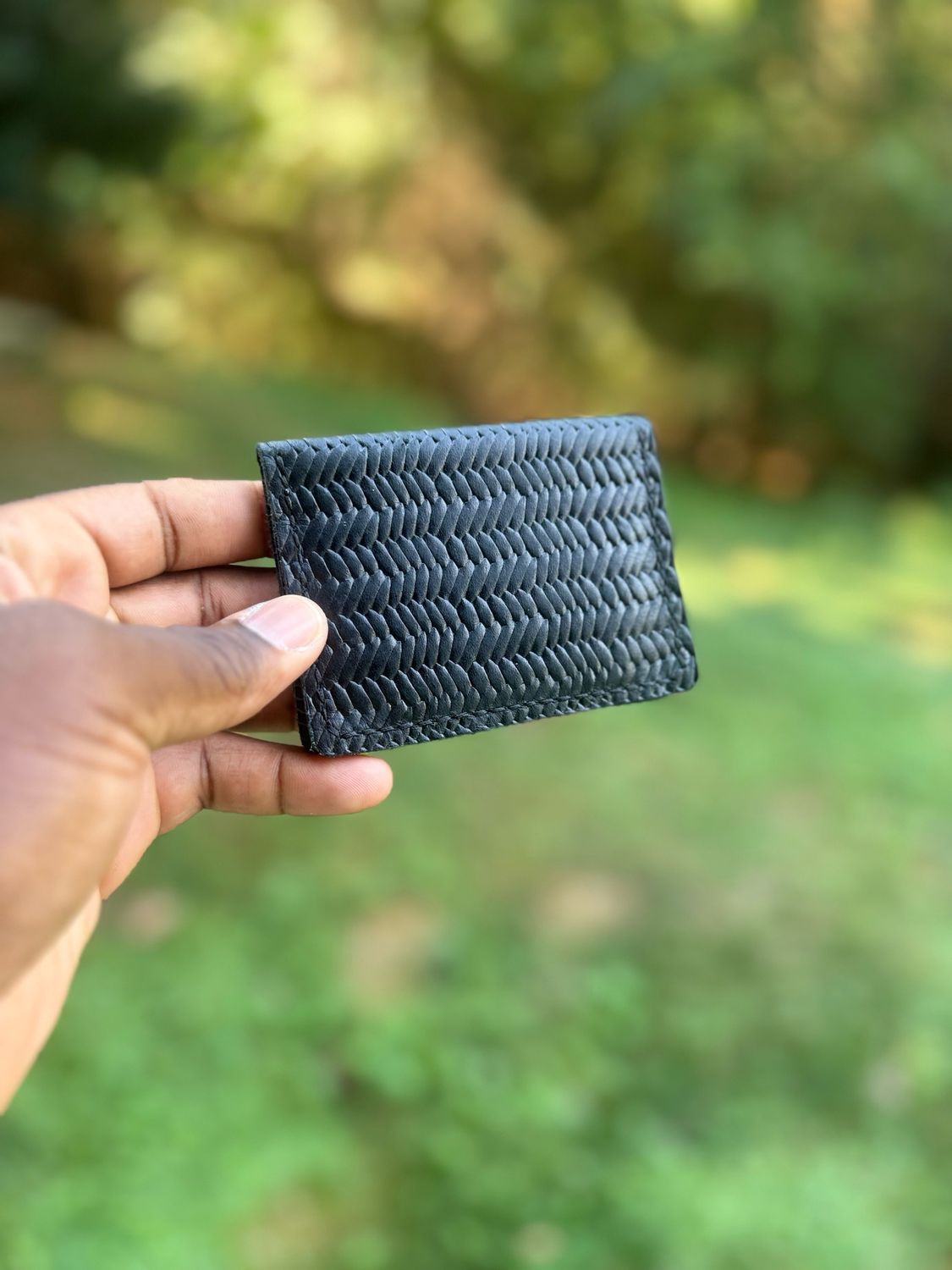 The “E” Black Woven Bifold Wallet