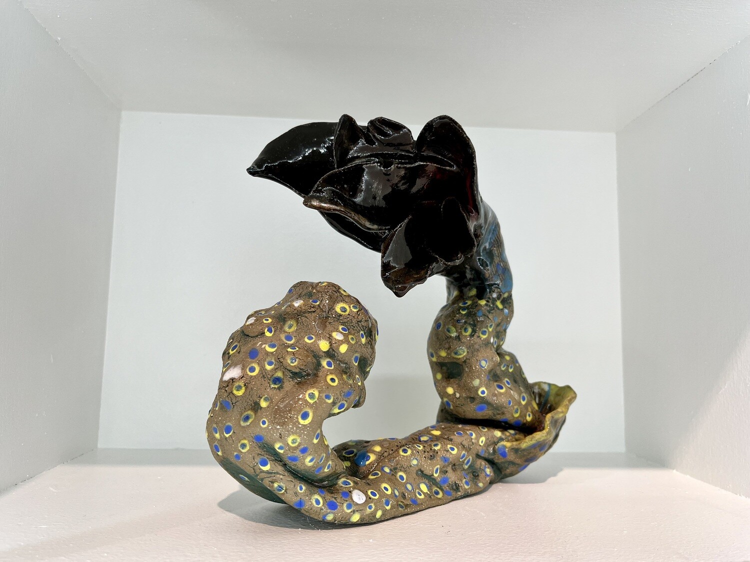 Brown Flower with Blue and Yellow Dots