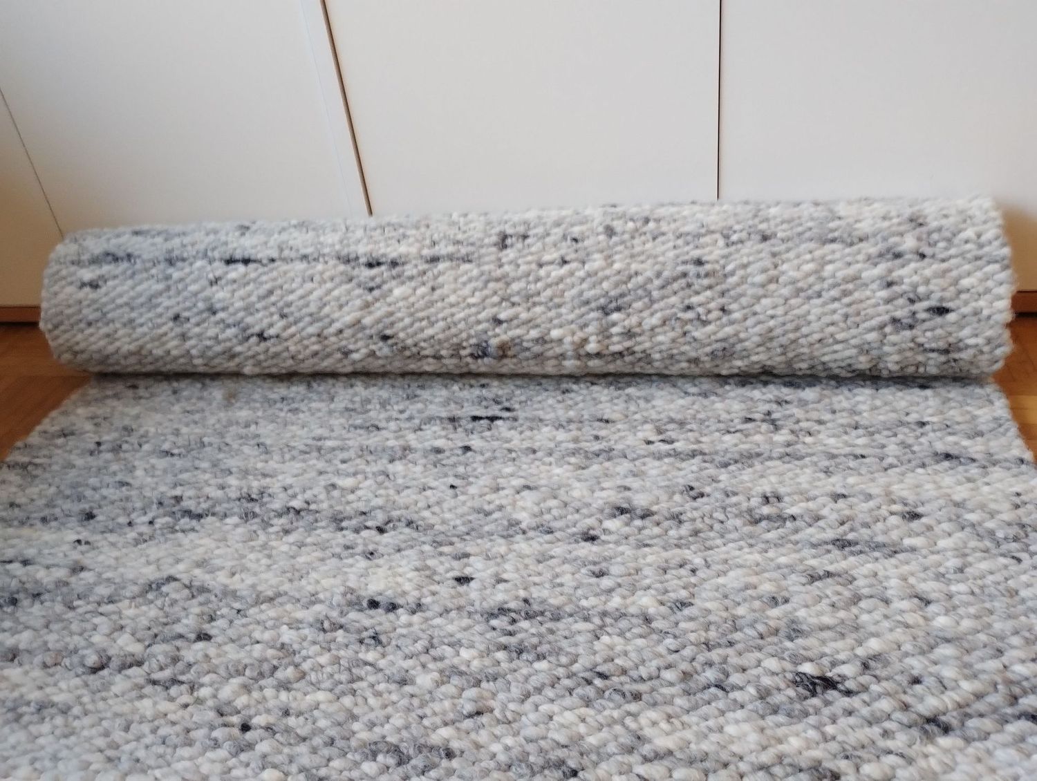 Schurwollteppich beige