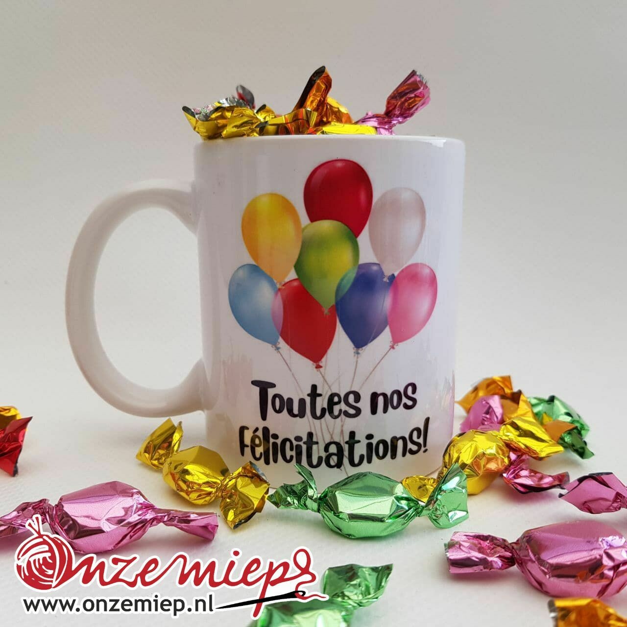 Mok of beker met "Toutes nos félicitations!"