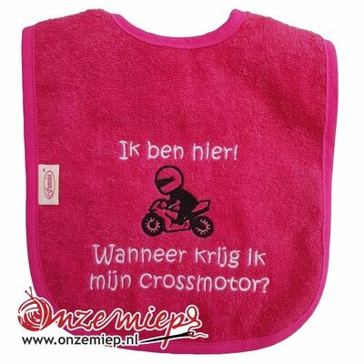Roze (fuchsia) slab met &quot;Ik ben hier! Wanneer krijg ik mijn crossmotor?&quot;