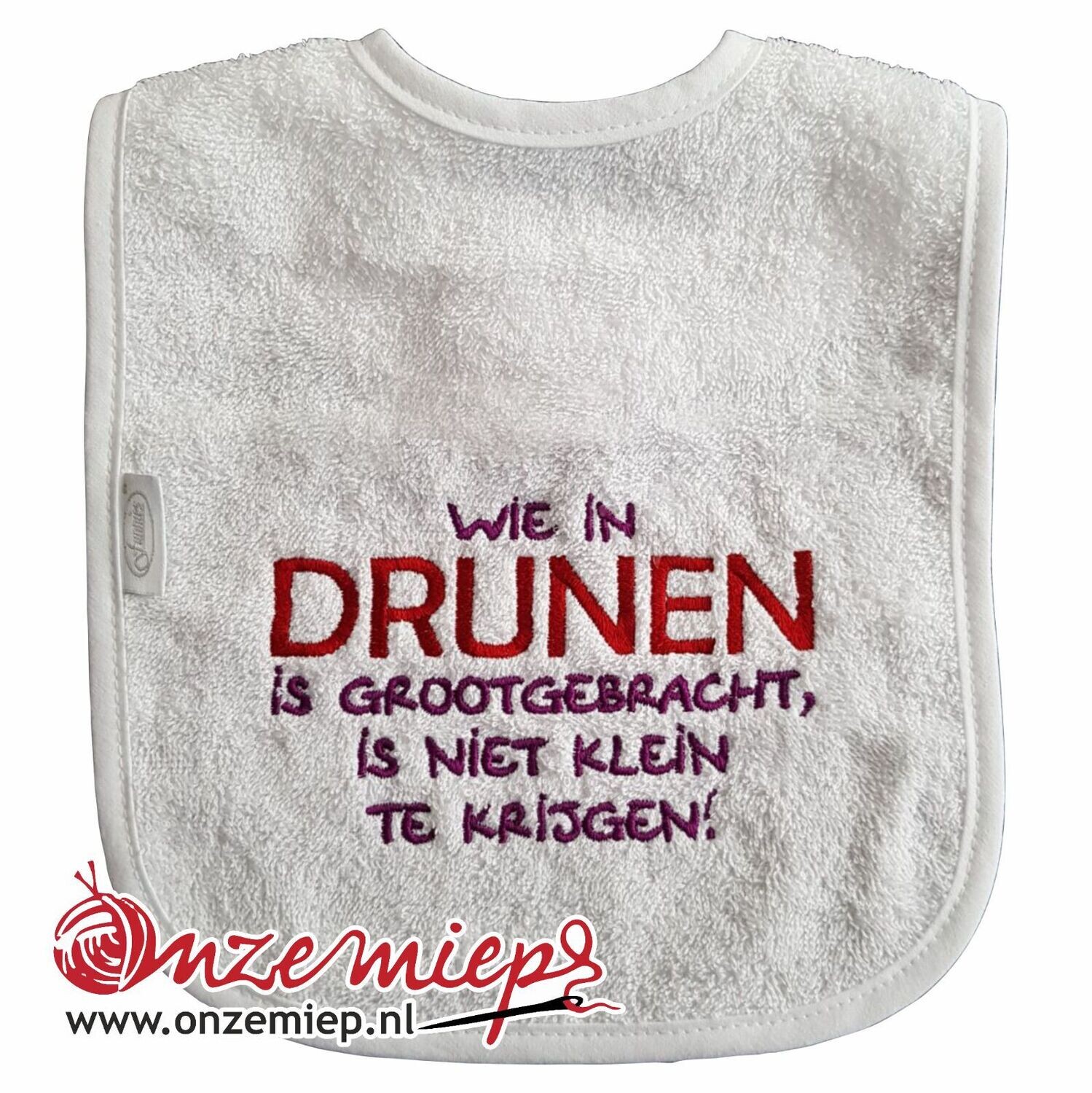 Witte slab met &quot;Wie in Drunen is grootgebracht, is niet klein te krijgen!&quot;
