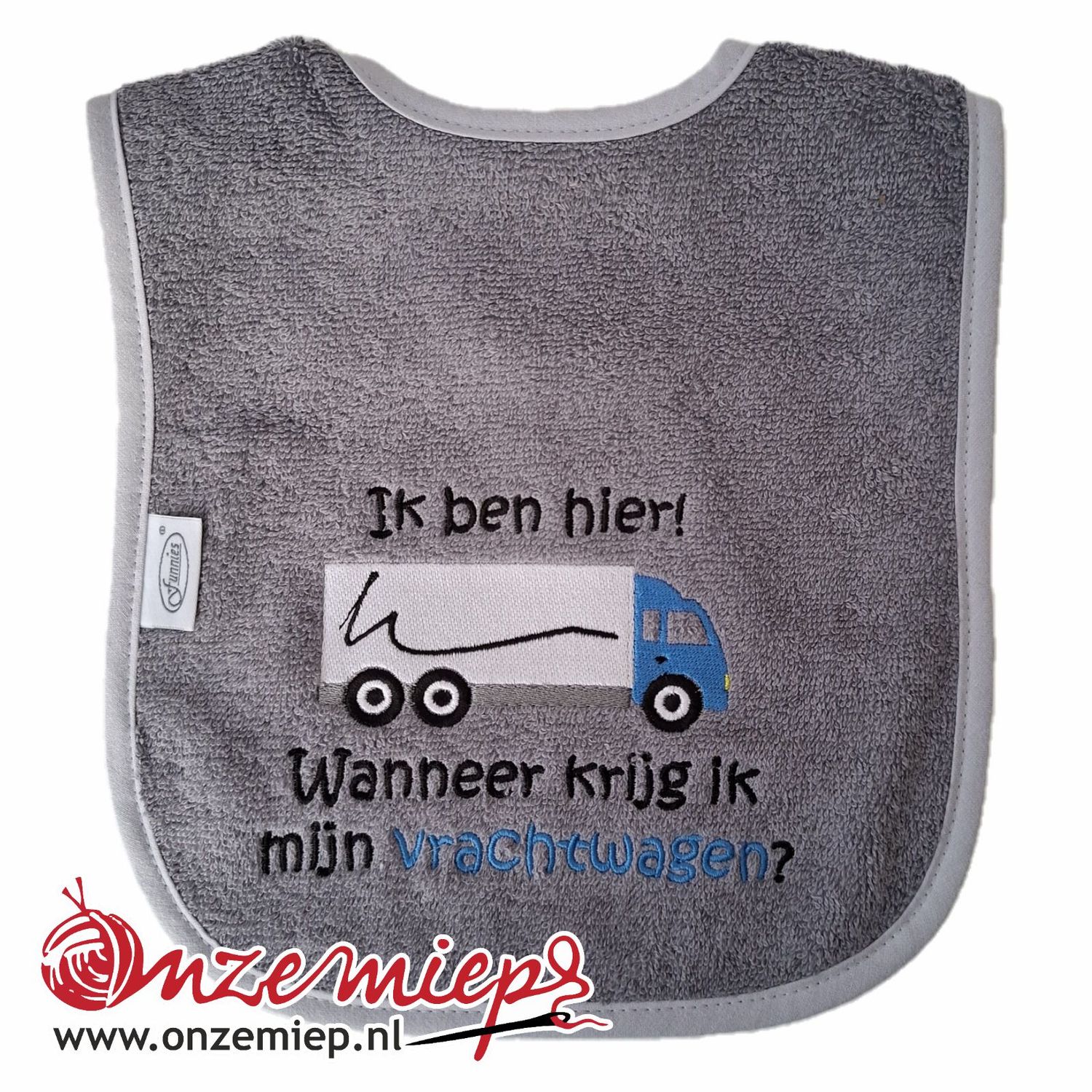 Grijze slab met &quot;Ik ben hier! Wanneer krijg ik mijn vrachtwagen?&quot; - Blauwe vrachtwagen