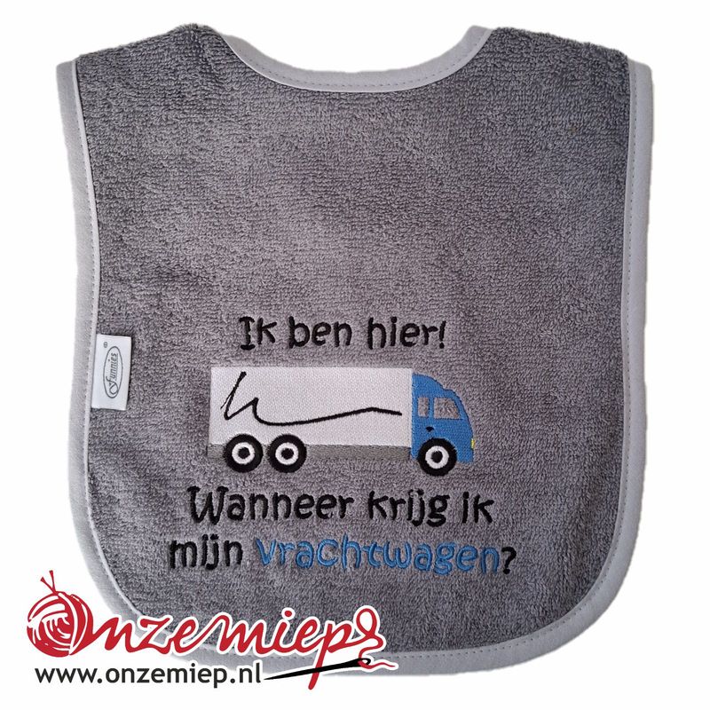 Grijze slab met &quot;Ik ben hier! Wanneer krijg ik mijn vrachtwagen?&quot; - Blauwe vrachtwagen