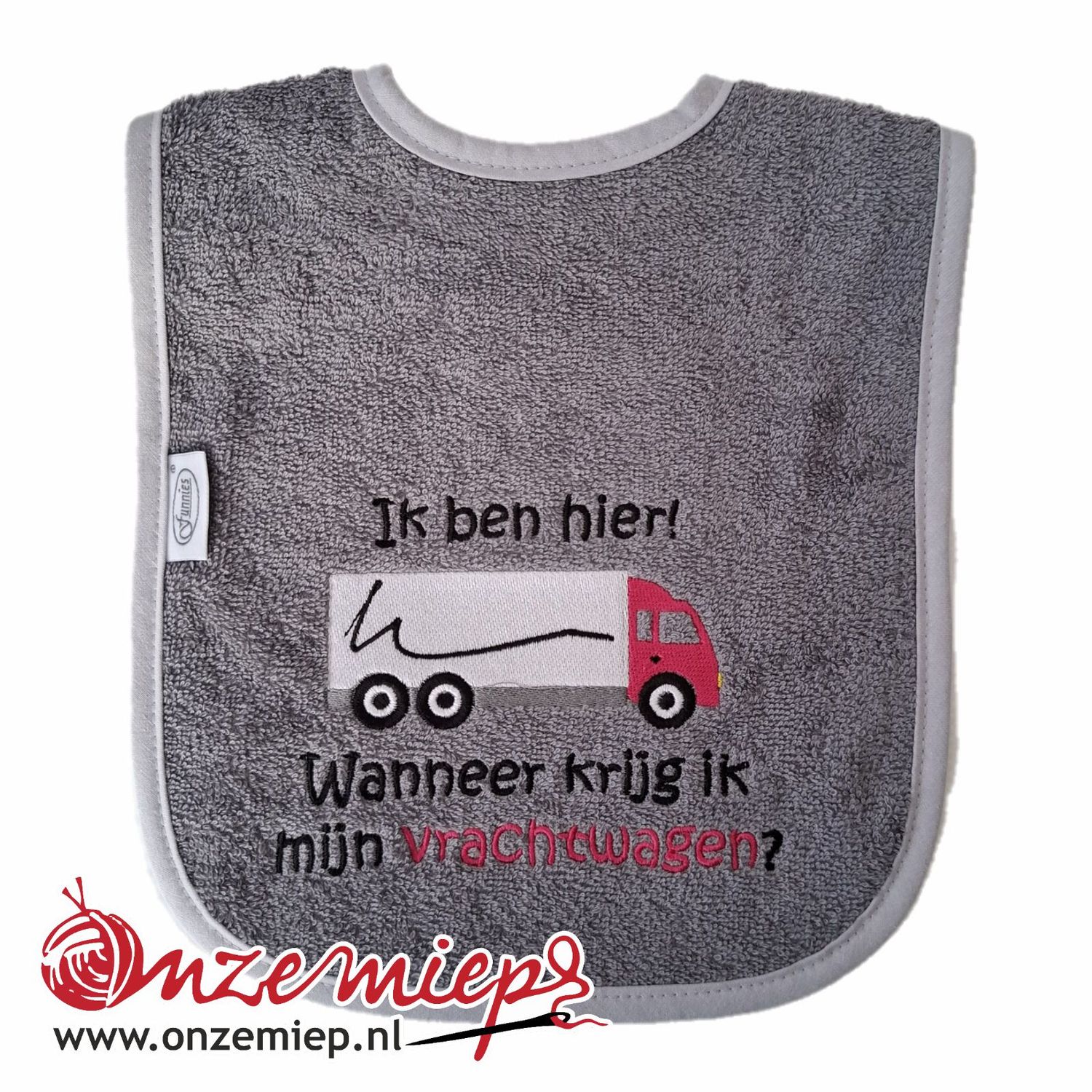 Grijze slab met &quot;Ik ben hier! Wanneer krijg ik mijn vrachtwagen?&quot; - Roze vrachtwagen