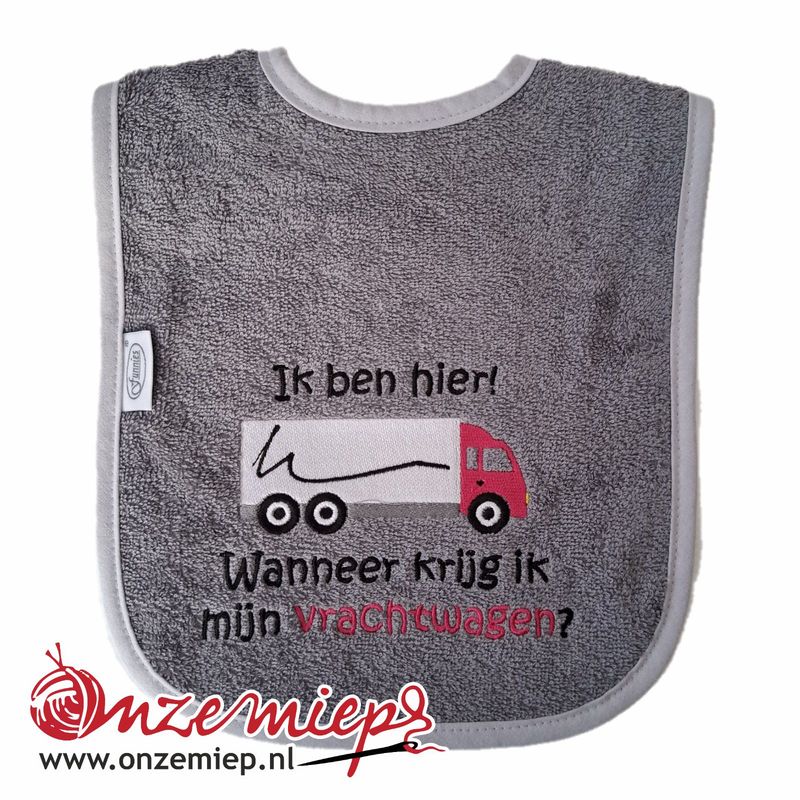 Grijze slab met &quot;Ik ben hier! Wanneer krijg ik mijn vrachtwagen?&quot; - Roze vrachtwagen