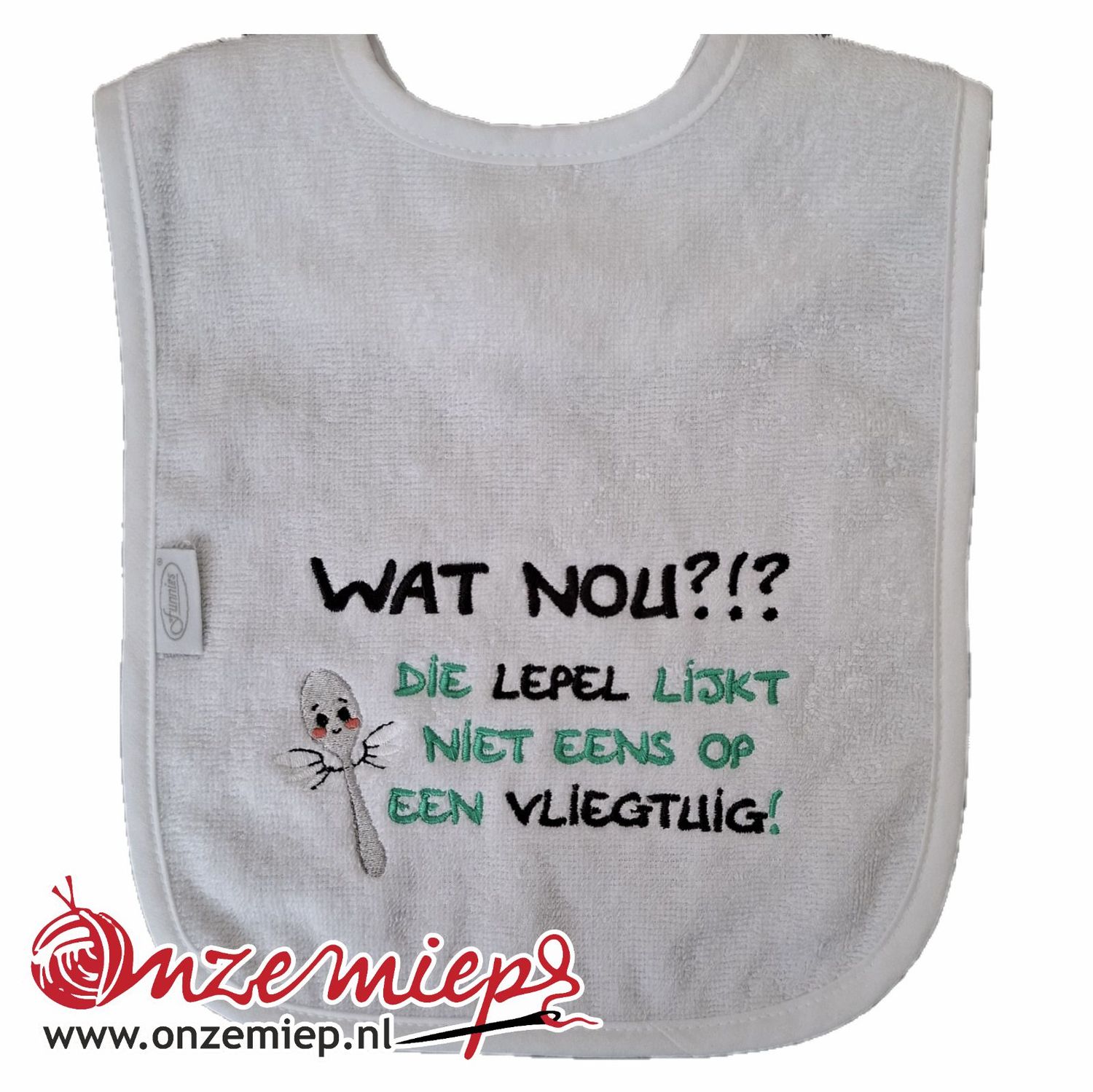 Witte slab met &quot;Wat nou?!? Die lepel lijkt niet eens op een vliegtuig!&quot;