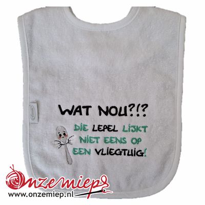 Witte slab met &quot;Wat nou?!? Die lepel lijkt niet eens op een vliegtuig!&quot;