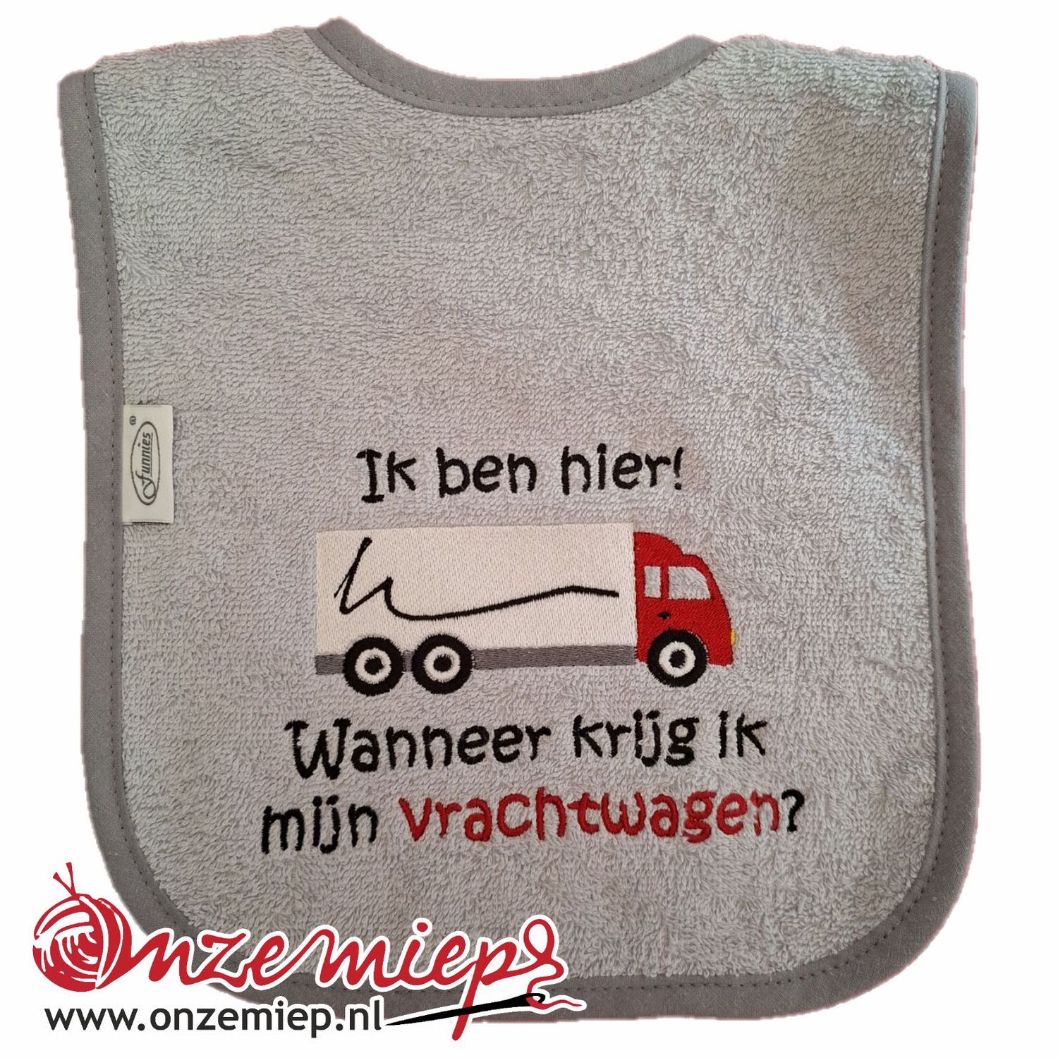 Grijze  slab met &quot;Ik ben hier! Wanneer krijg ik mijn vrachtwagen?&quot; - Rode vrachtwagen