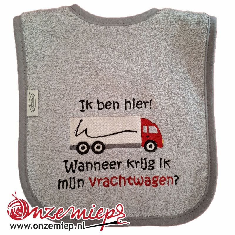 Grijze  slab met &quot;Ik ben hier! Wanneer krijg ik mijn vrachtwagen?&quot; - Rode vrachtwagen