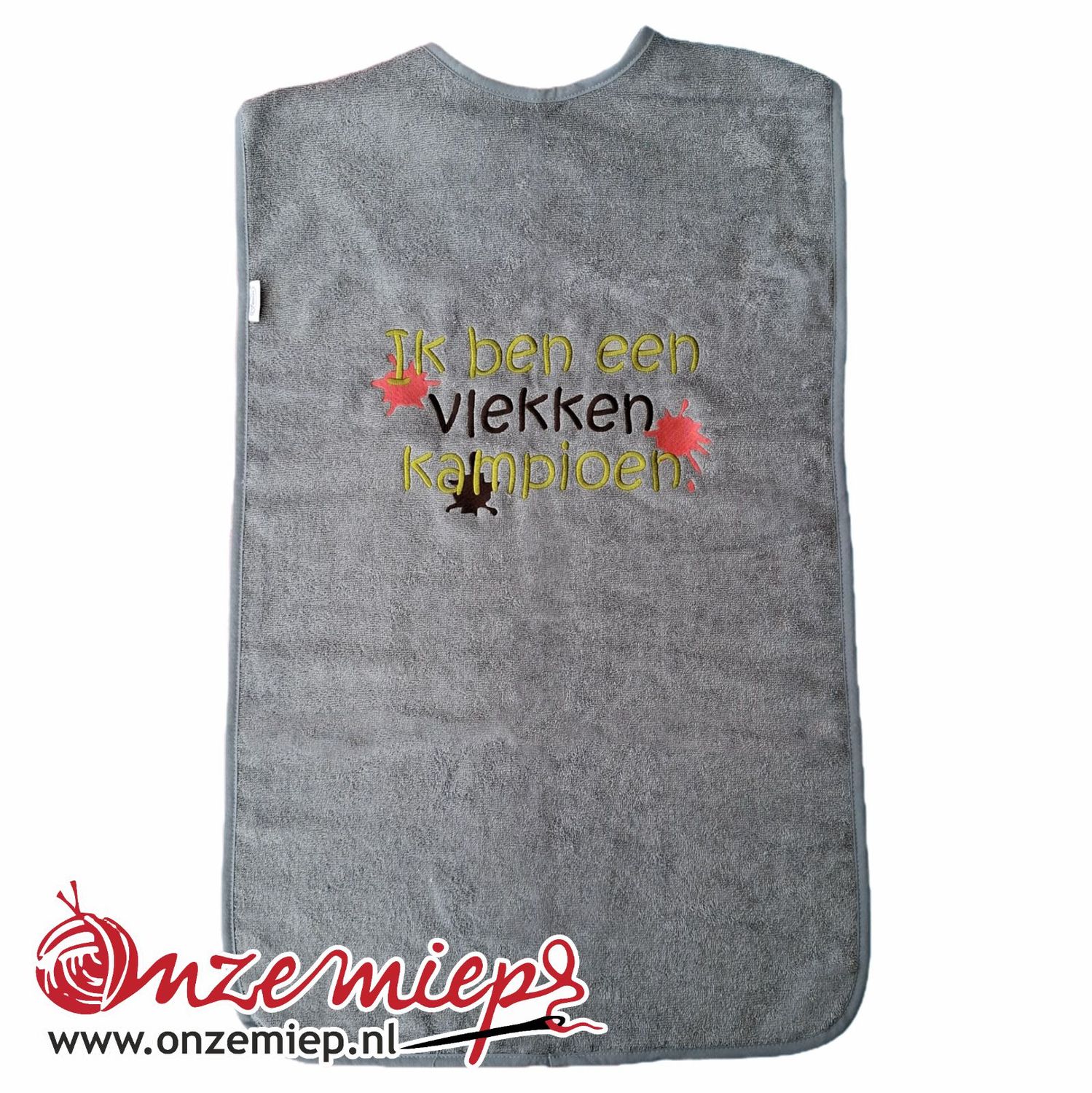 Grijs/blauwe slab voor volwassenen met "Ik ben een vlekken kampioen" - 50 x 100 cm