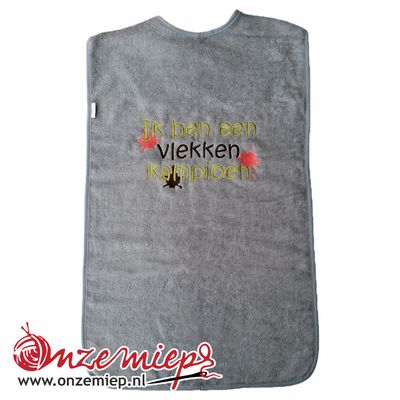 Grijs/blauwe slab voor volwassenen met "Ik ben een vlekken kampioen" - 50 x 100 cm