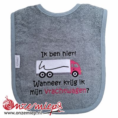 Grijze slab met "Ik ben hier! Wanneer krijg ik mijn vrachtwagen?" - Roze vrachtwagen