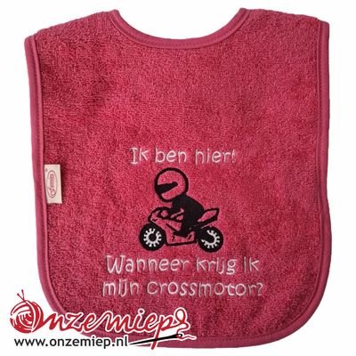 Roze (fuchsia) slab met &quot;Ik ben hier! Wanneer krijg ik mijn crossmotor?&quot;