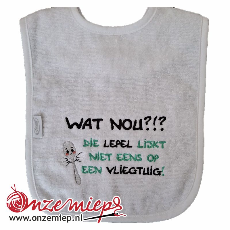 Witte slab met "Wat nou?!? Die lepel lijkt niet eens op een vliegtuig!"