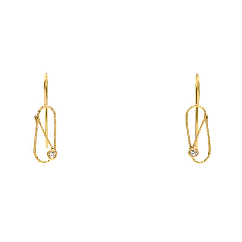 Boucles d&#39;oreilles en fil d’or et diamants