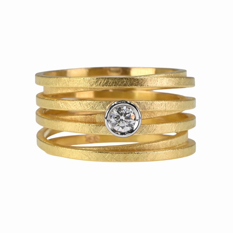Bague en anneau d’or et diamant
