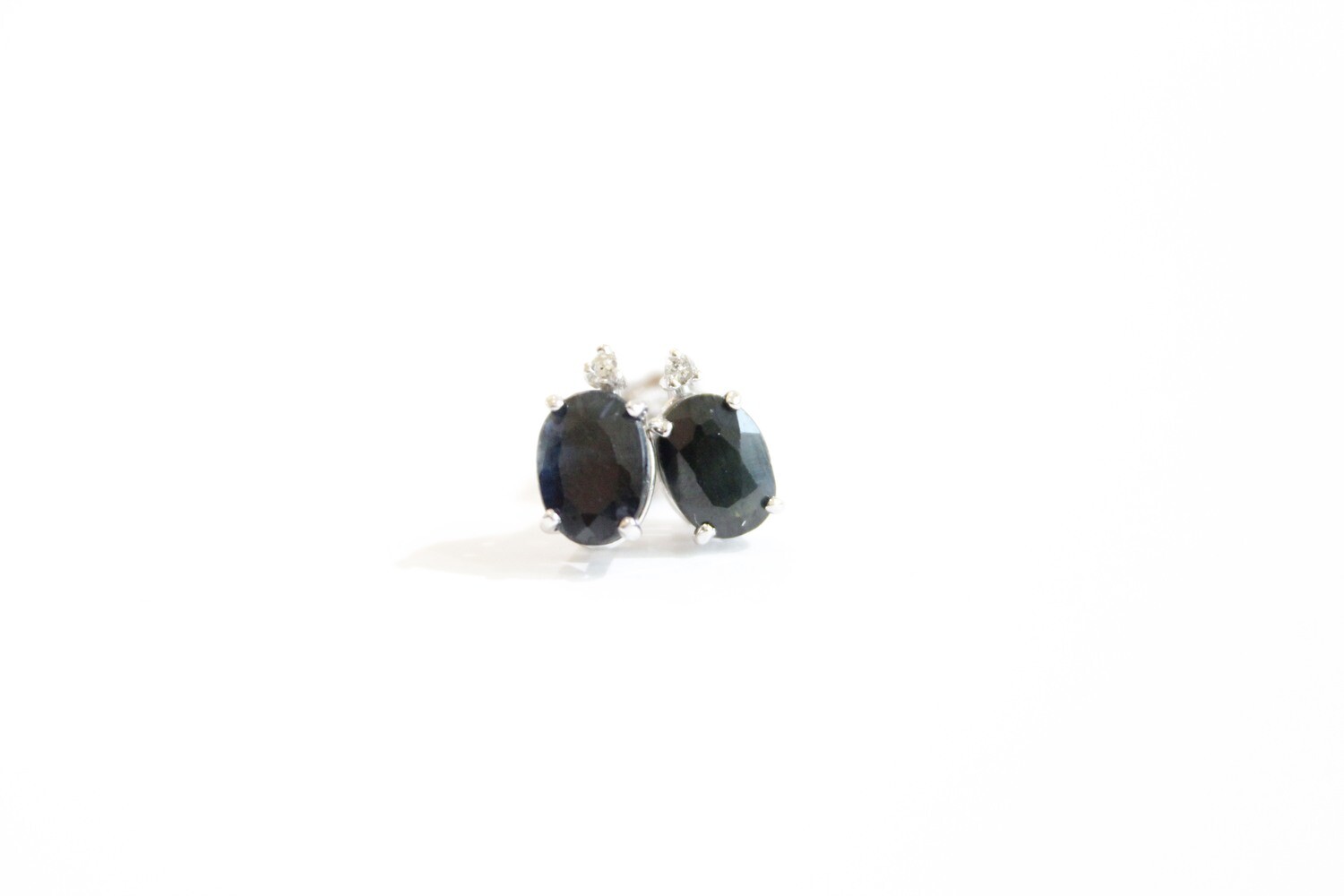 14KT WHITE GOLD 1.94CT, 5x7MM OVAL MIDNIGHT SAPPHIRE EARRINGS WITH DIAMOND ACCENT  