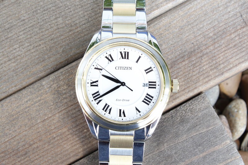 Citizen Men&#39;s Two Tone Stainless Cream Face with Black Hands and Numbers 