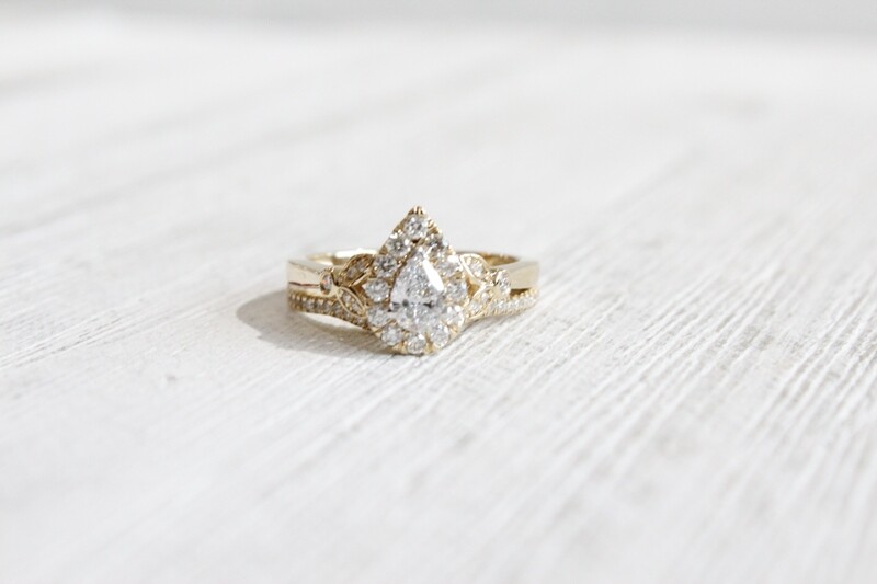 14ky .77ct Total Pear Halo with Leaf Design on Shank and Matching Curved Band, 1 at .31ct &amp; 53 at .46ct Total 