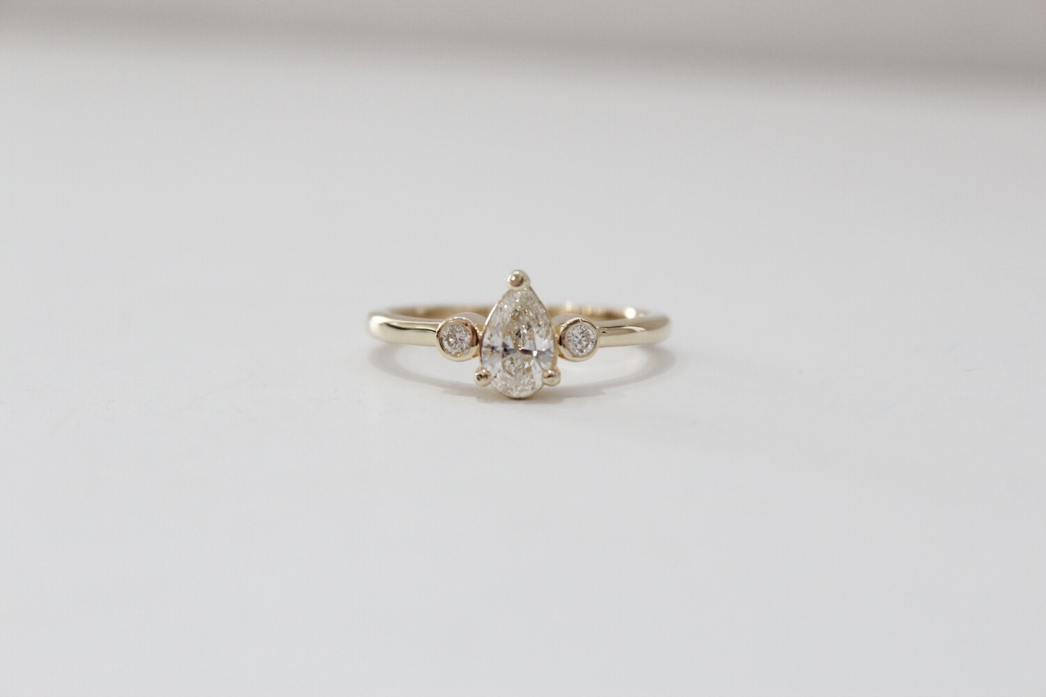 14ky .66ct Total Pear &amp; Round Diamond Three Stone Ring, 1 at .64ct &amp; 2 at .06ct Total 