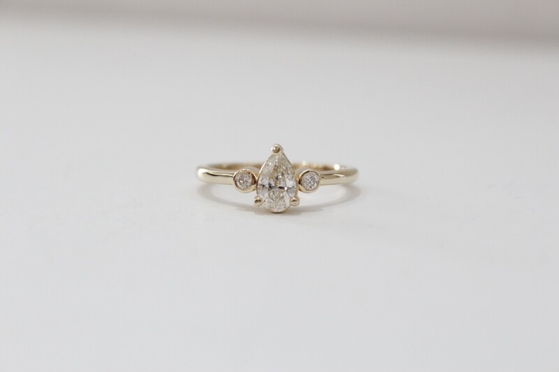 14ky .66ct Total Pear &amp; Round Diamond Three Stone Ring, 1 at .64ct &amp; 2 at .06ct Total 