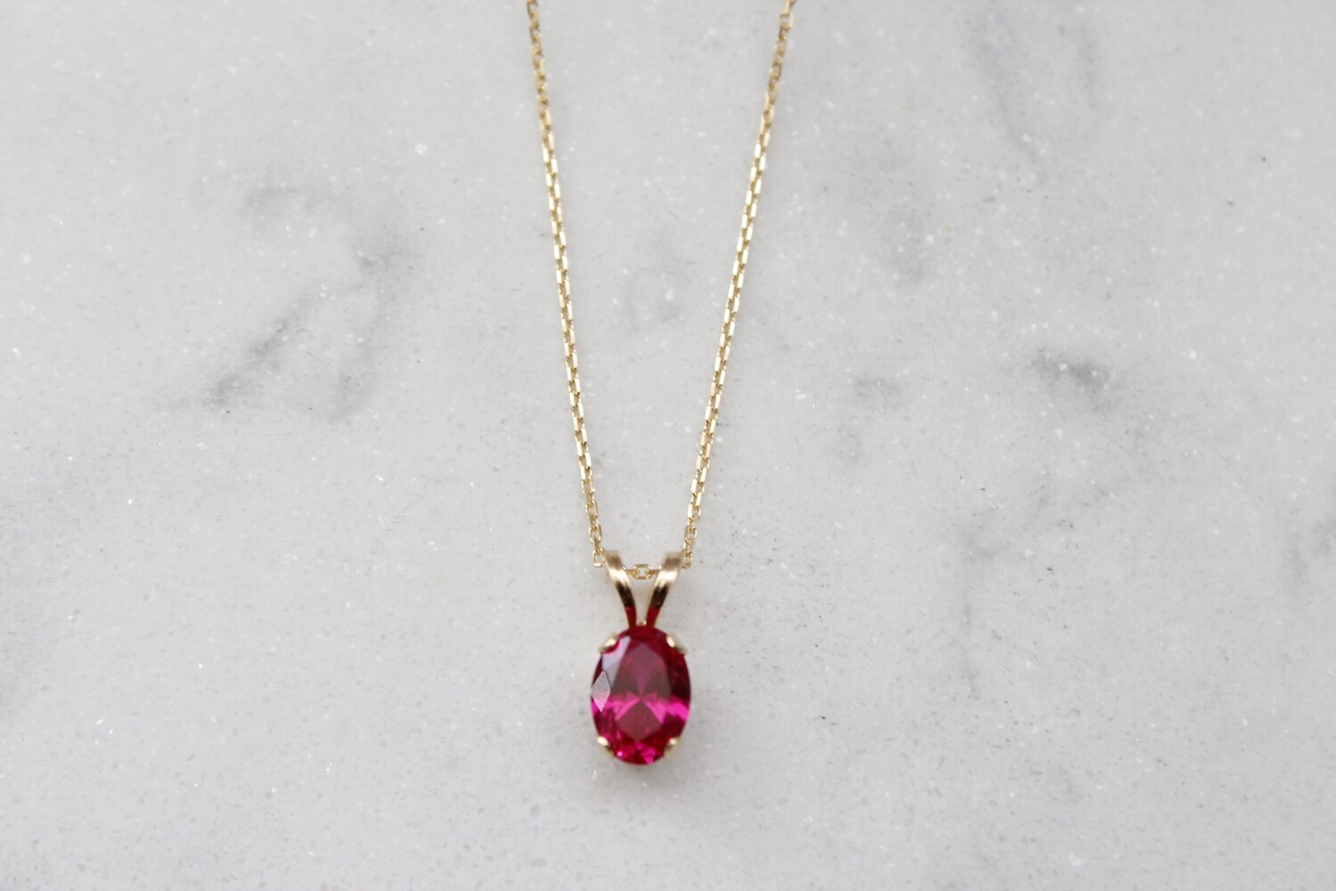 14ky Oval Ruby 4 Prong Pendant on 10ky 18" .8mm Diamond Cut Cable Chain 14ky Oval Ruby 4 Prong Pendant on 10ky 18" .8mm Diamond Cut Cable Chain
